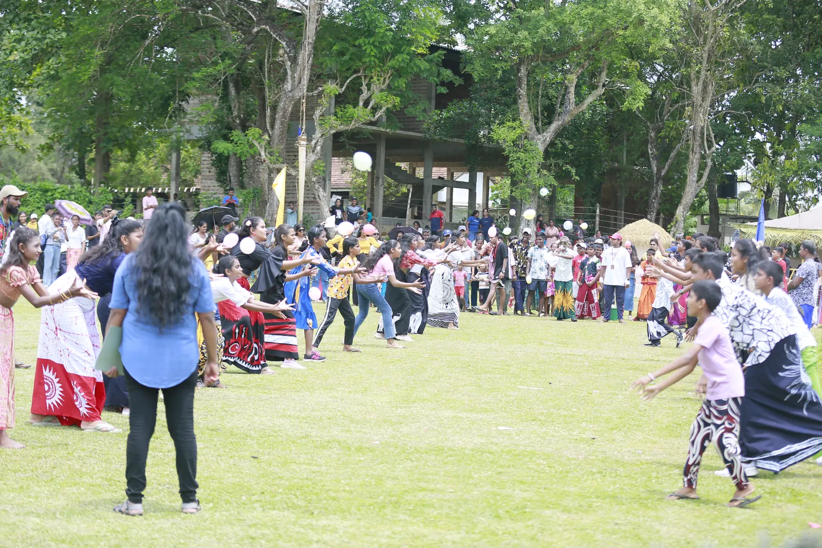 Students playing a group ball game outdoors