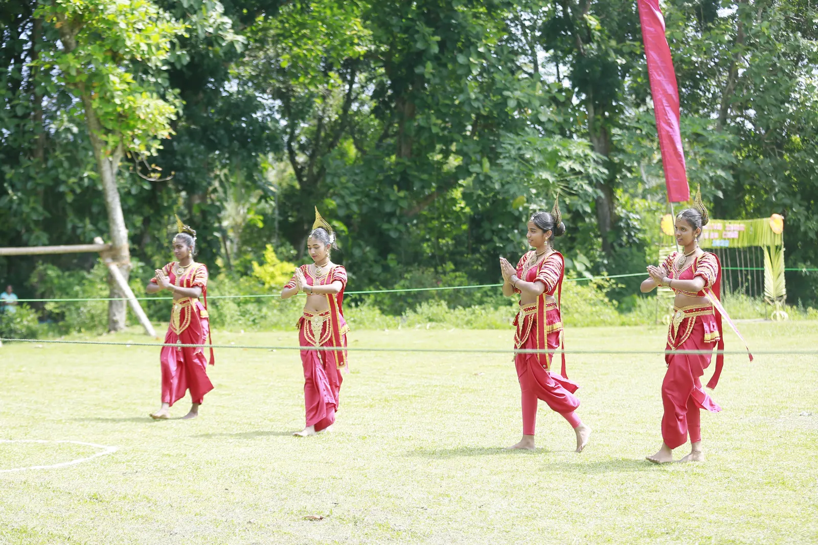 Students performing a traditional dance at the event