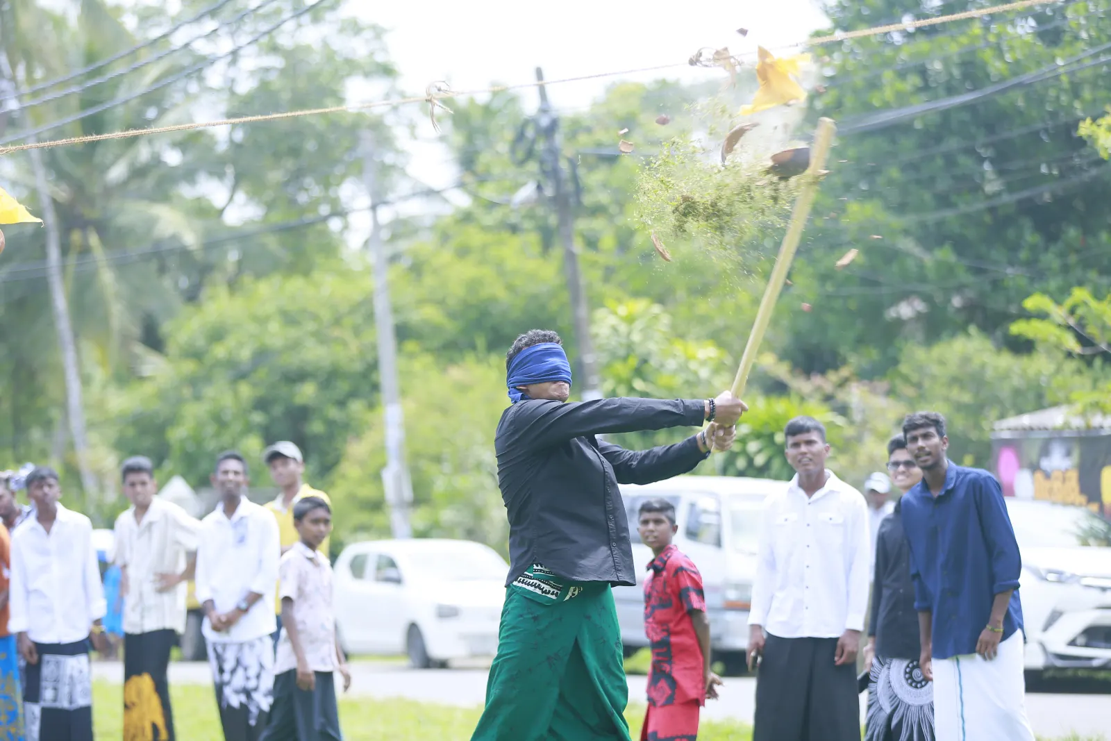 A blindfolded participant enjoying a team game