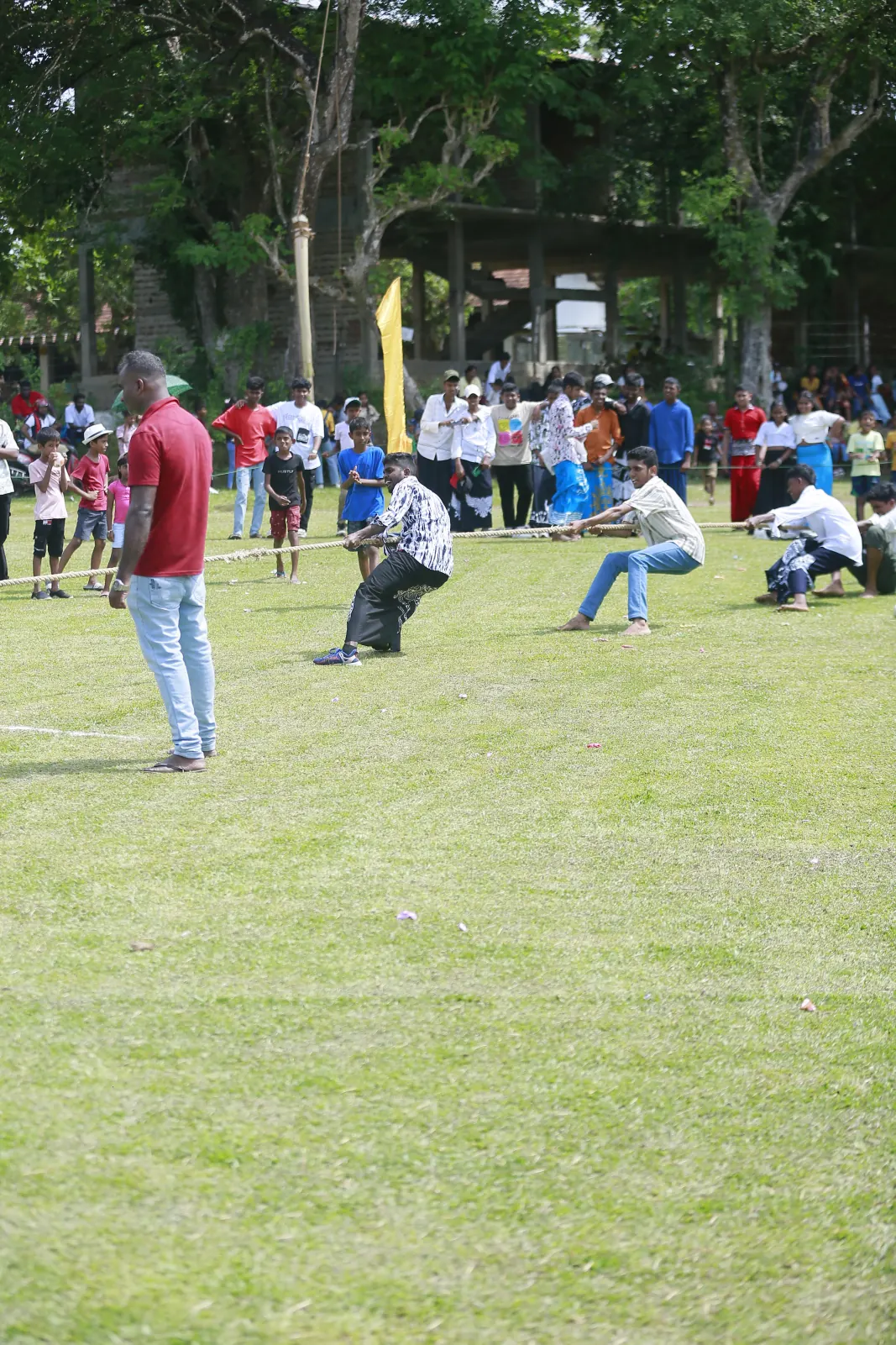 Students competing in a friendly tug of war